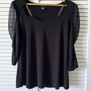 Chic Black Blouse with Chain Accents